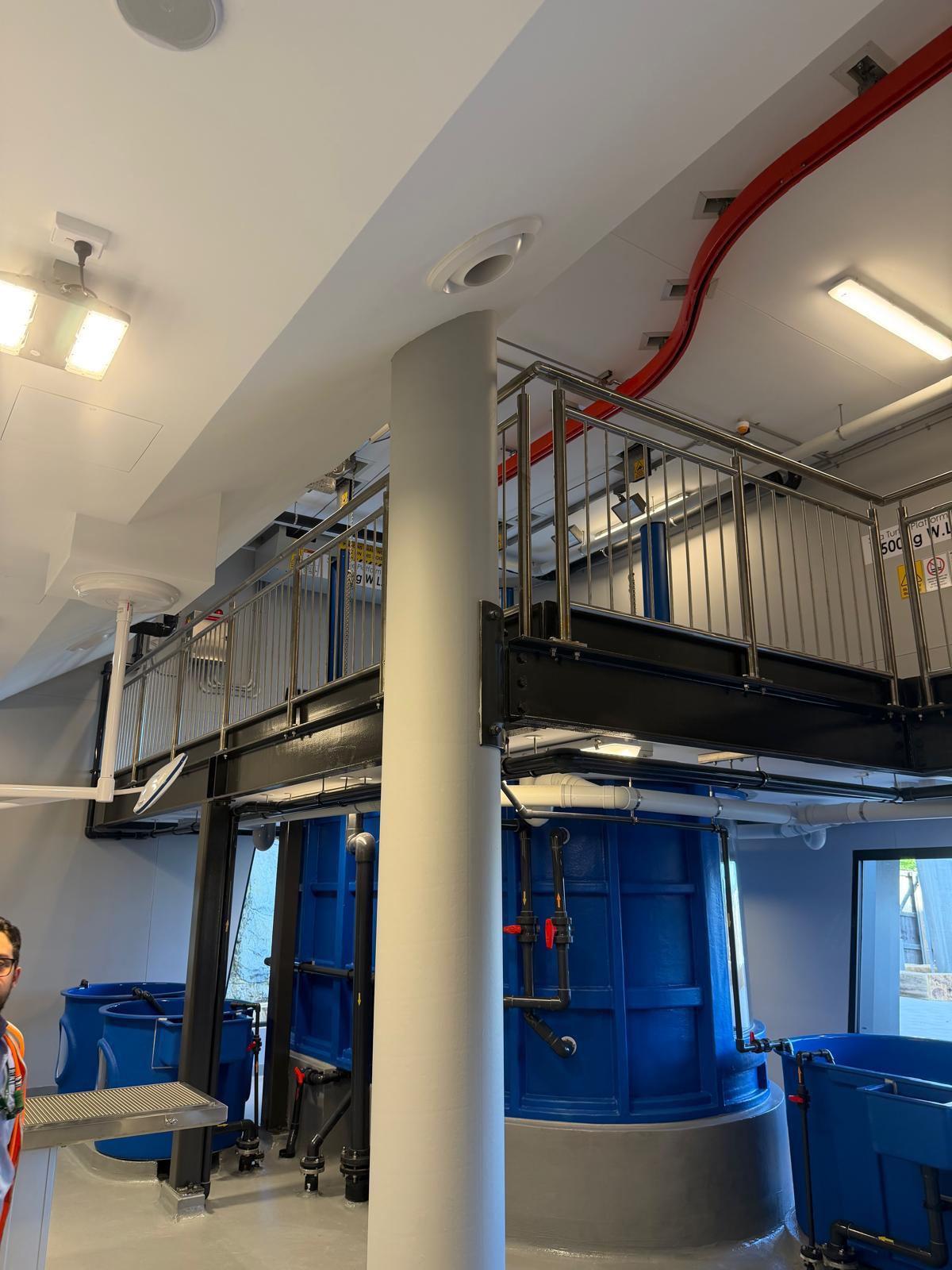 Steel access platform integrated around operational equipment at Taronga Zoo